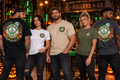 Halloween Logo Arm Wrestling  Unisex T-Shirt | Pullers & Co. Haunted Crest Tee